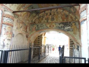 Monistary Entrance. You can see the stuco painting on the entrance wall. The thickness of these walls is for defence against attackers.