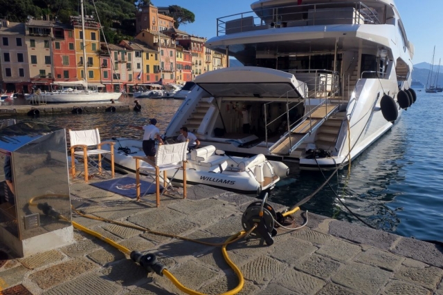 A self-respecting yacht must have a dingy, garage, and hydraulic platform