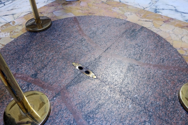 The Oculus lets the rain in. The floor is concave. Holes in the floor drain the water.