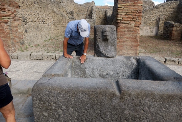 The wall of the water fountain was worn smooth from people leaning over to drink. Romans used lead pipes, unknowingly poisoning themselves.